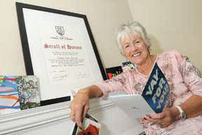Jenny, at home with her award